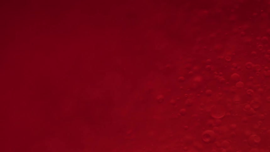 Abstract red liquid with bubbles