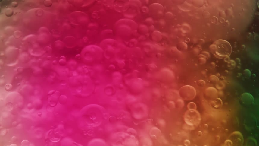 Abstract moving colorful liquid with bubbles