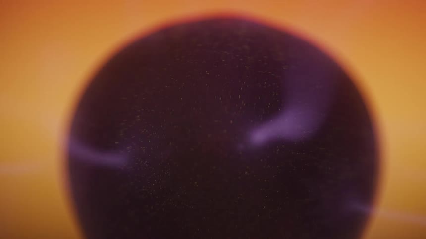 Blue light arcs inside an orange plasma sphere