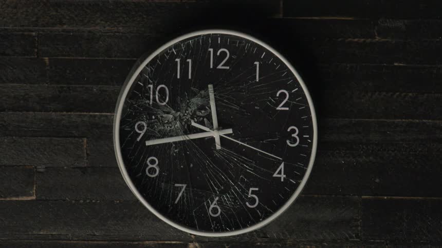 Clock on a wall with moving hand