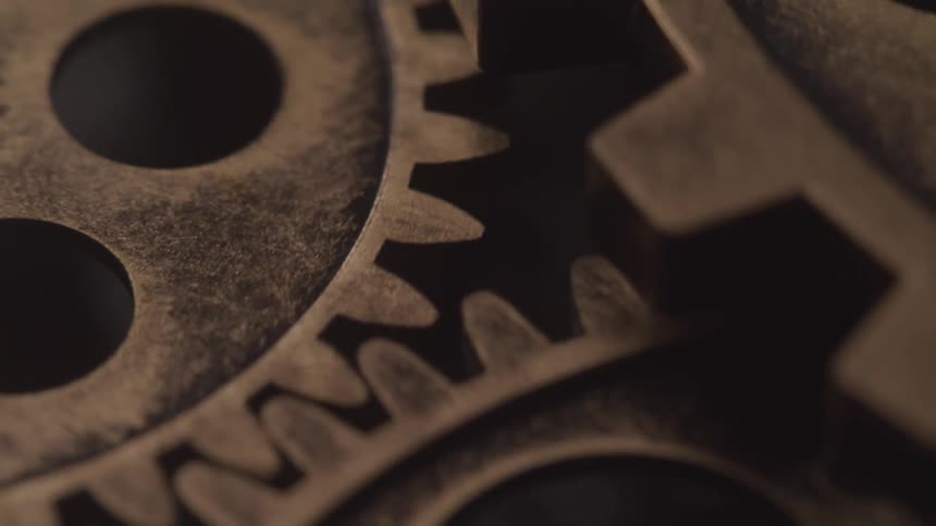 Gears turn in sync with one another