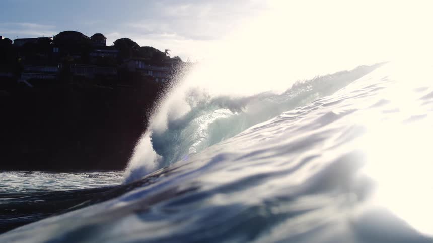 A wave crashes in slow motion
