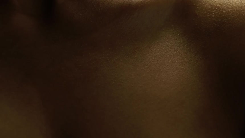 The light shines on her shoulder