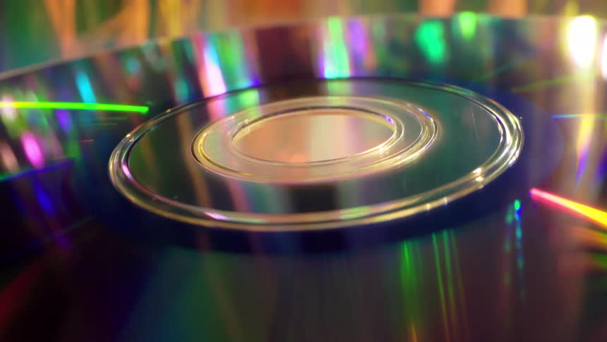 Close up of a cd with light reflection