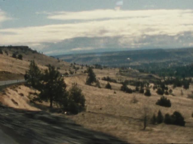 Driving past a large canyon
