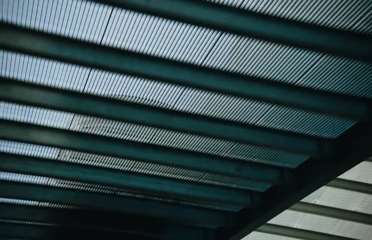 Car passing on an overpass during the day