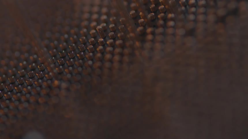 Pins move up and down on a surface