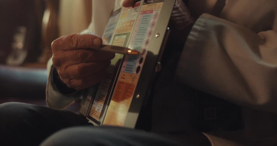 A man is presenting a brochure