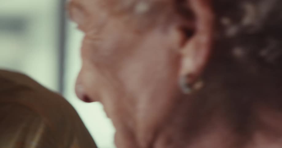 A man and woman are talking and laughing together