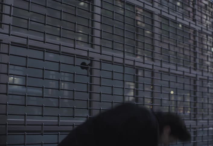 Strong wind blows the mans hat off