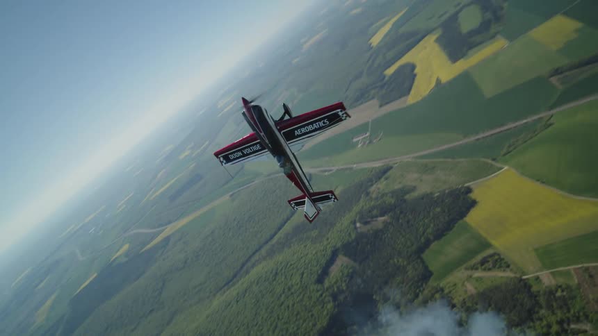 Small plane performing aerial maneuvers
