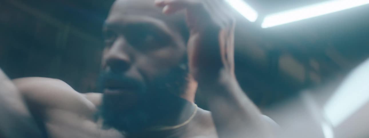The man is punching in the ring