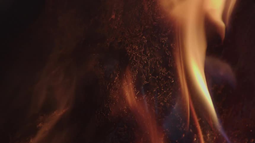 The meat is being charred with fire