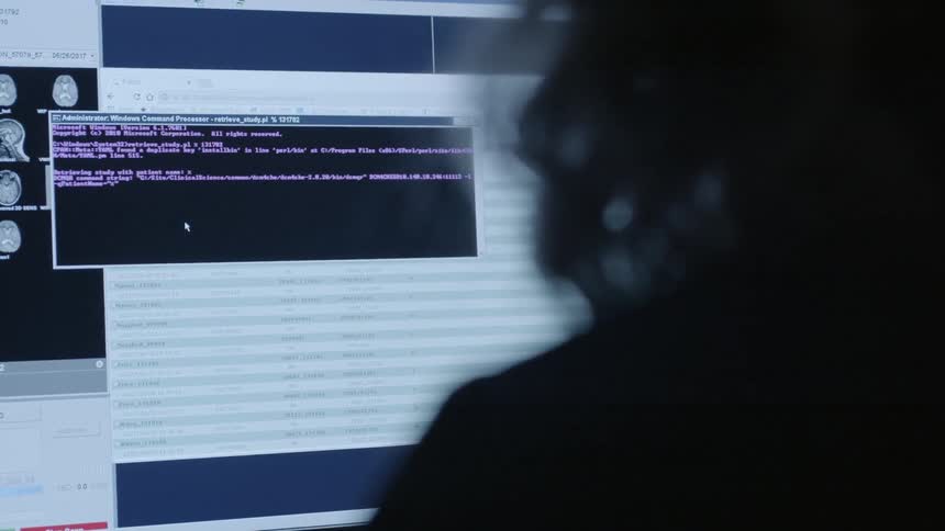 A person is working on a computer