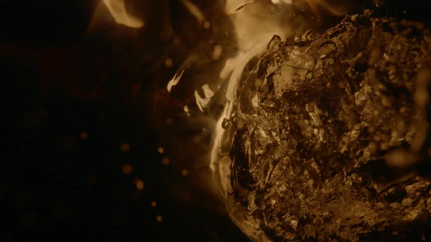 A fire is breaking out reflecting in the water