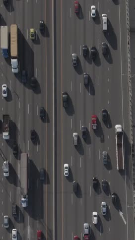 Aerial of a very busy city highway in the middle of the day