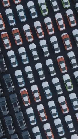All the spots in the parking lot are full of cars