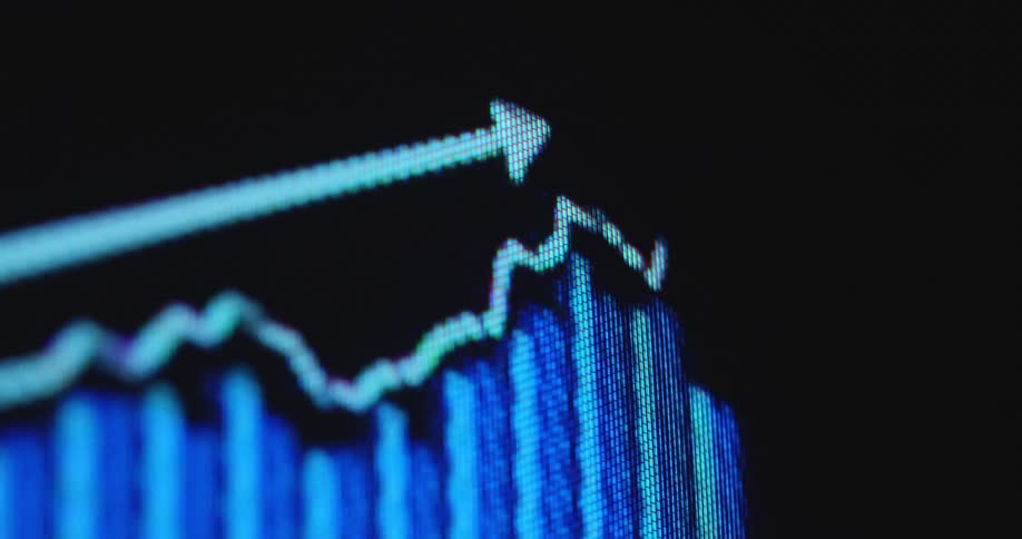 Digital pixelated graph with positive trendline going up showing growth and financial strength of the global or US economy or an economical upward trend while making progress and profiting from business opportunities