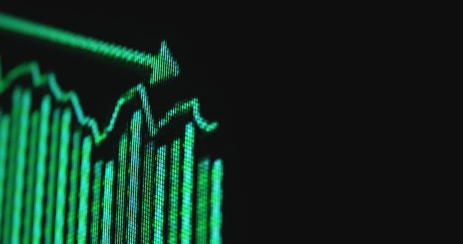A neon green retro monitor displays a chart showing the movement of a stock price with an arrow crashing with a dramatic downward or negative tendency or direction causing investors to lose money presented by data visualization