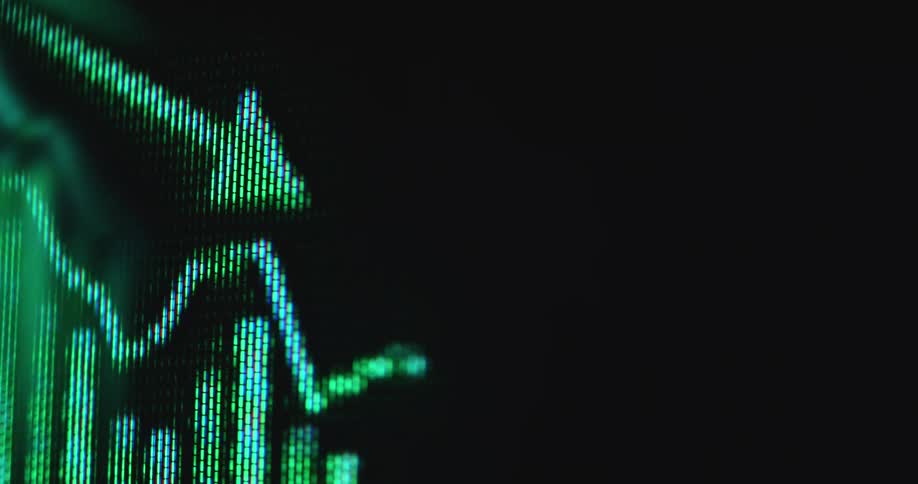 Dramatic macro close up with shaky camera movement of a screen showing animated financial trading chart or business statistic with negative outlook prediction or development in neon green retro colors