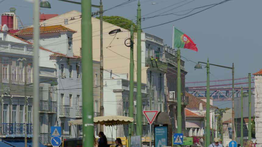 People walk down a neighborhood street