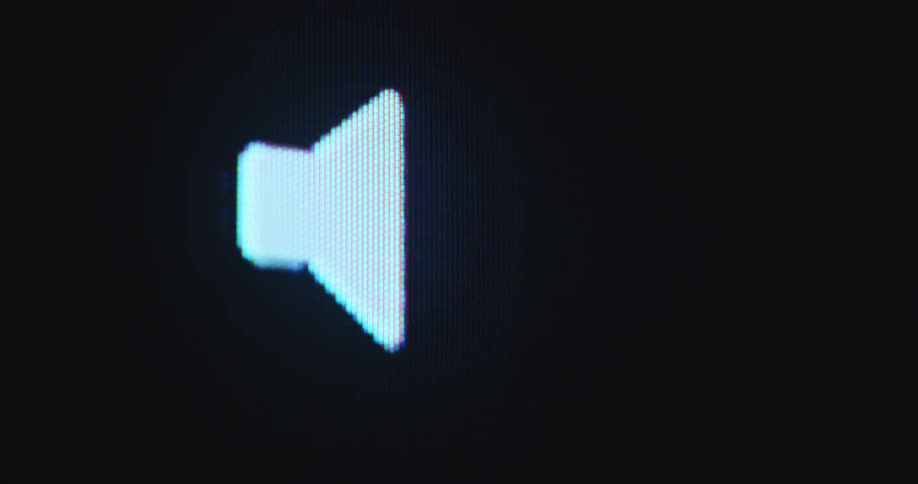 A pixelated sound symbol or speaker icon being displayed on a black retro RGB panel of a vintage 90s computer screen symbolizing the processing of sound in the early digital age or internet era