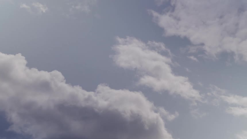 Clouds move across the sky towards the left during the day