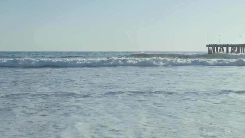 Waves crashing against the beach