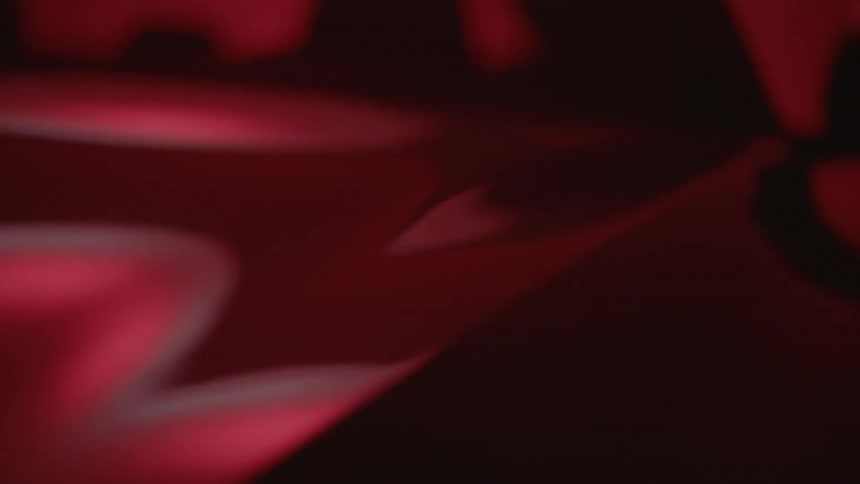 A red surface reflects light