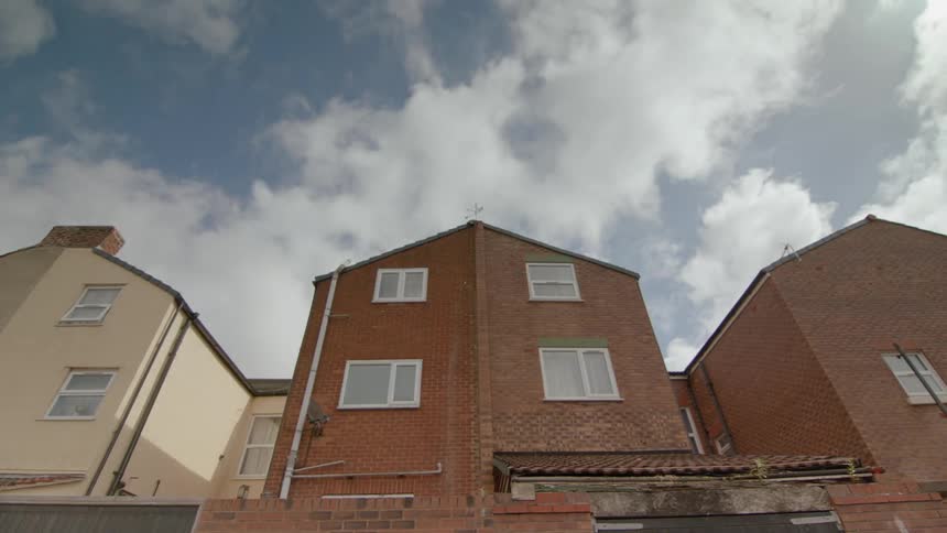 Clouds floating over residential buildings