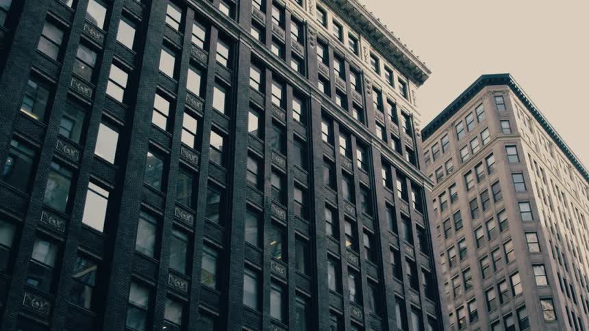 A couple large buildings side by side