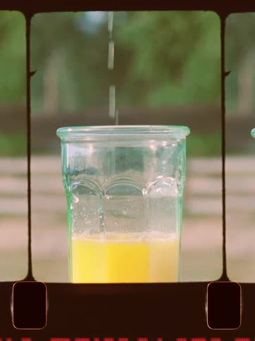 Liquid trickles down into a cup