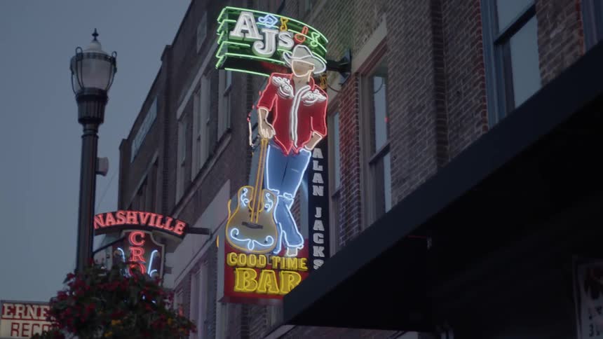 Neon signs on buildings downtown