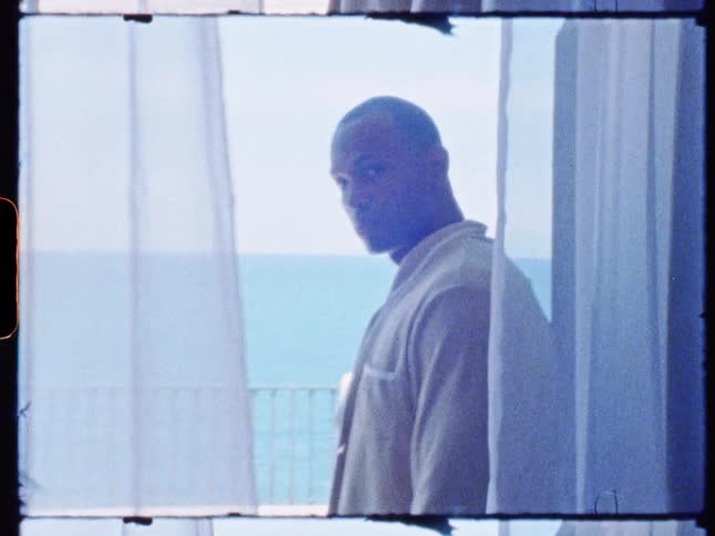 A man is standing in the doorway