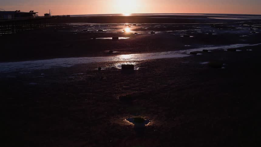 Wet ground as the sun rises
