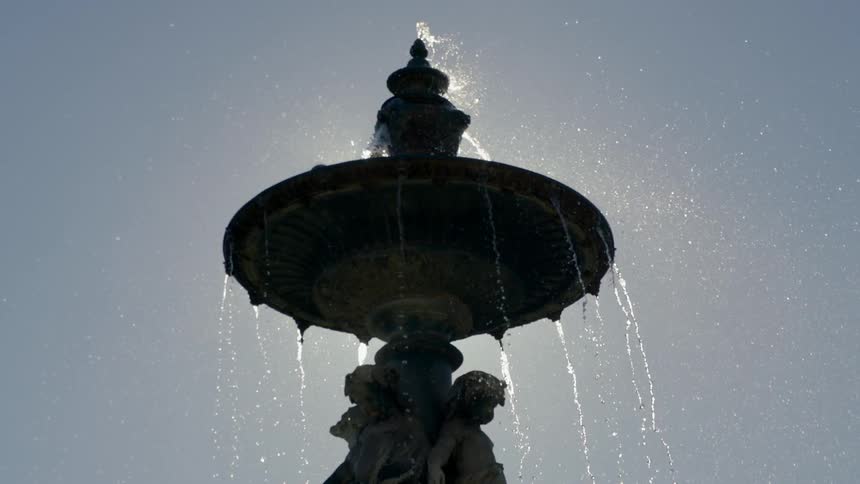 Water flows out of a fountain