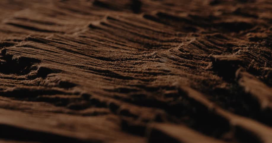 Chocolate like powder forms a textured surface