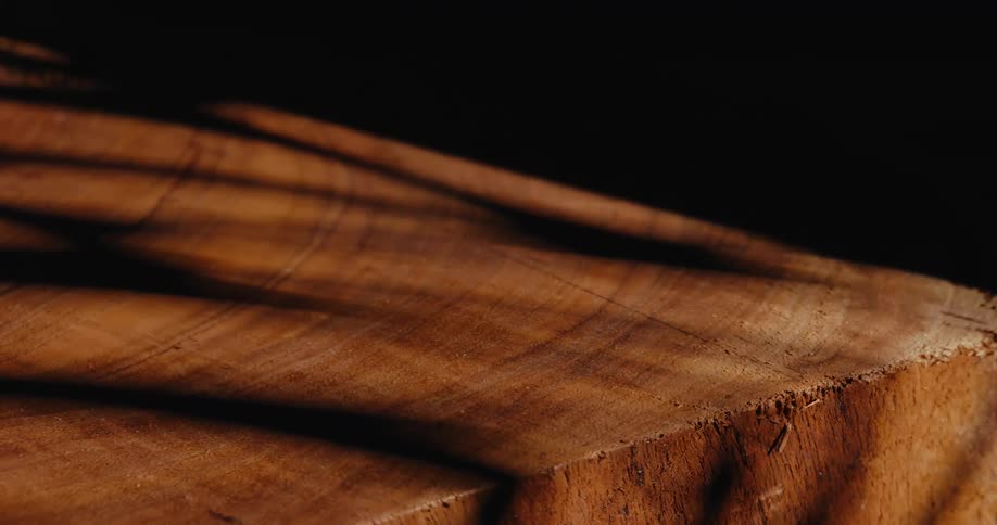 Play of light and shadow on varnished wood