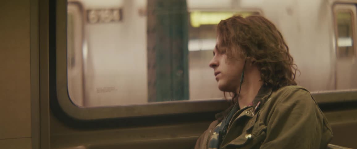 Man sleeping inside a train