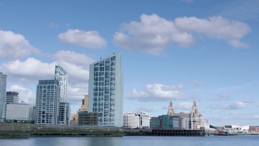 View of city buildings next to a body of water