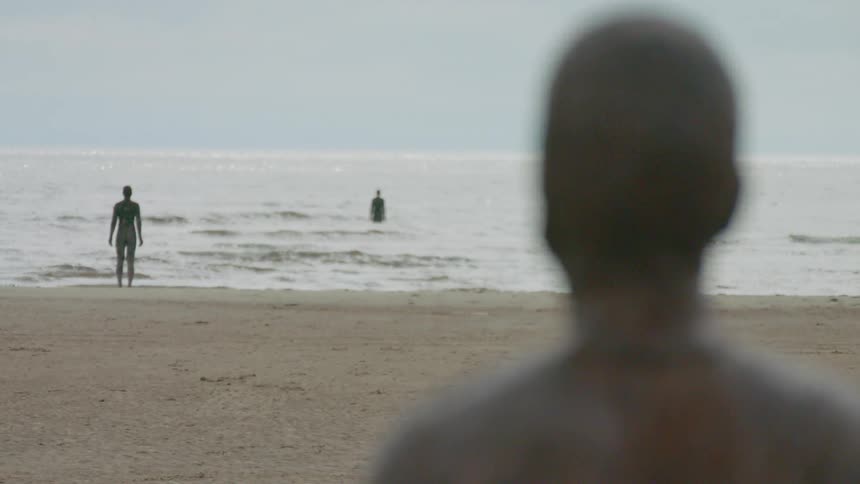 A statue as seen from behind