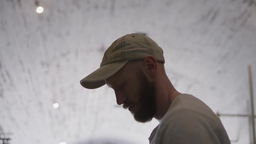 A man looks down and up