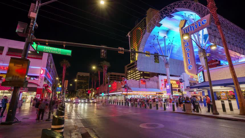 Pedestrians travel through the brightly Fremont Street Experience in downtown Las Vegas