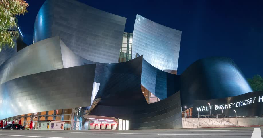 Walt Disney Concert Hall  with vehicle traffic at night