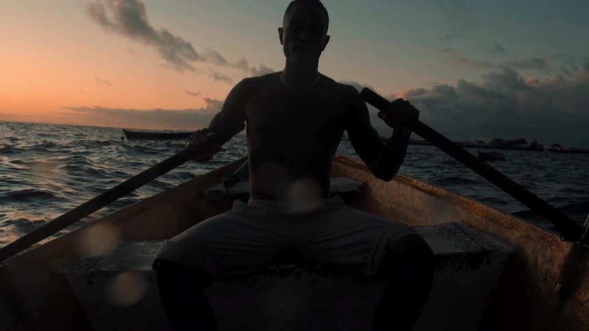 A man rows a boat