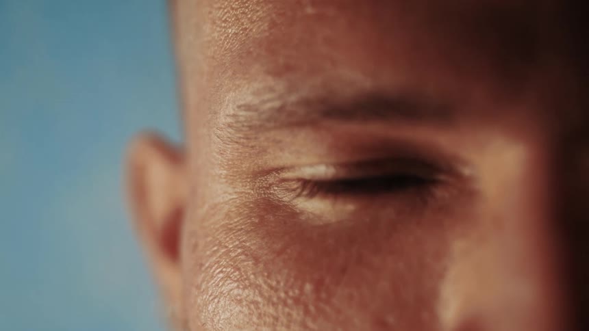 A man blinks his eye