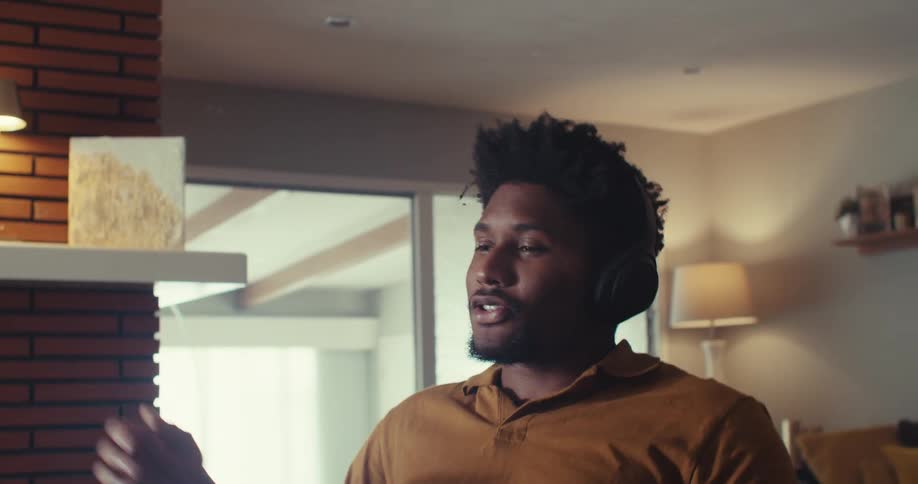 Man talks during a video call while working from home