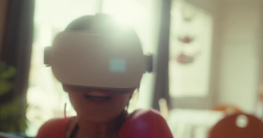 The woman sways her head back and forth while wearing a virtual reality headset