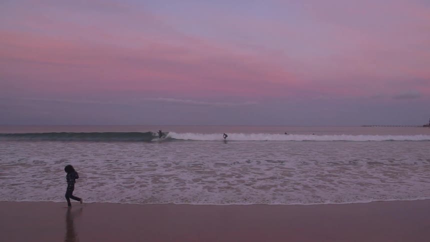 A person running on the beach