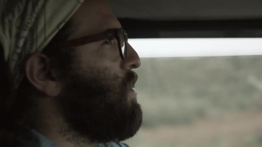 A man driving a truck